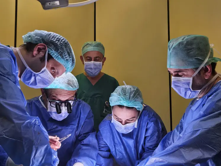 Surgeons working together at the operating table
