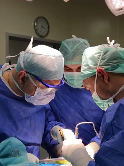 Surgeons in close focus during an operation