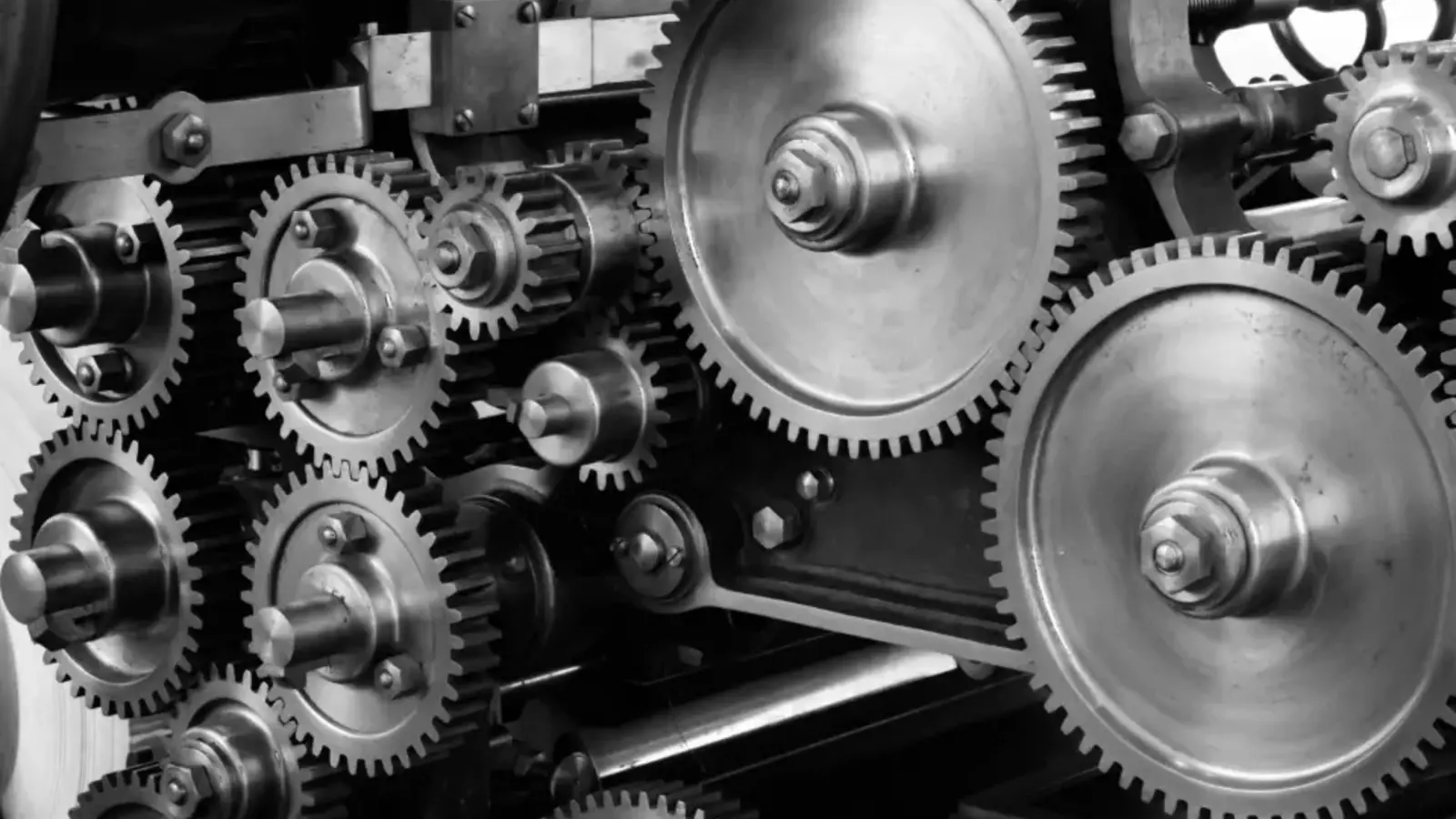 Close-up of interlocking metal gears in a machine