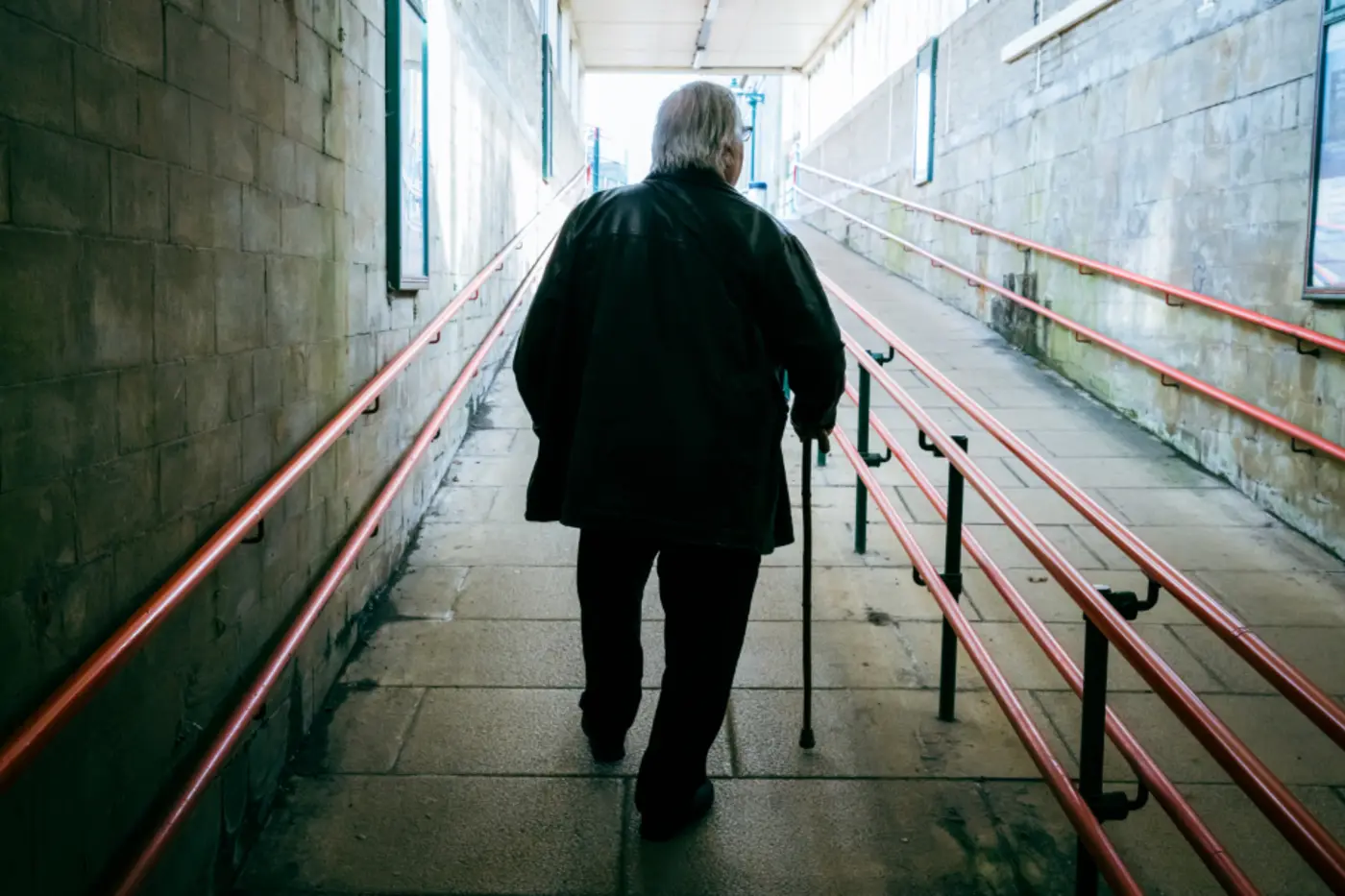An active man in his sixties walking outdoors